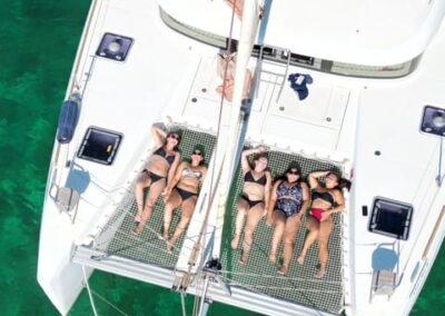 Alquiler de Catamarán en Mallorca cena, snorkel y paddel surf | TITOTRAVEL